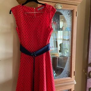 Brand is Danny and Nicole size 8 red with black polkadots